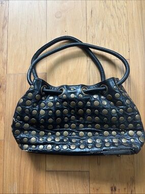 The Find studded and riveted handbag.